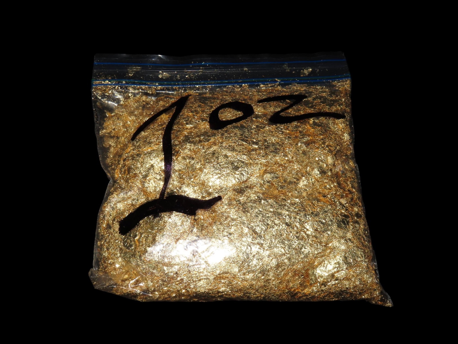 1 oz. Bag of Gold Flake from precious metal refinery in St Louis Missouri (1 of 2)