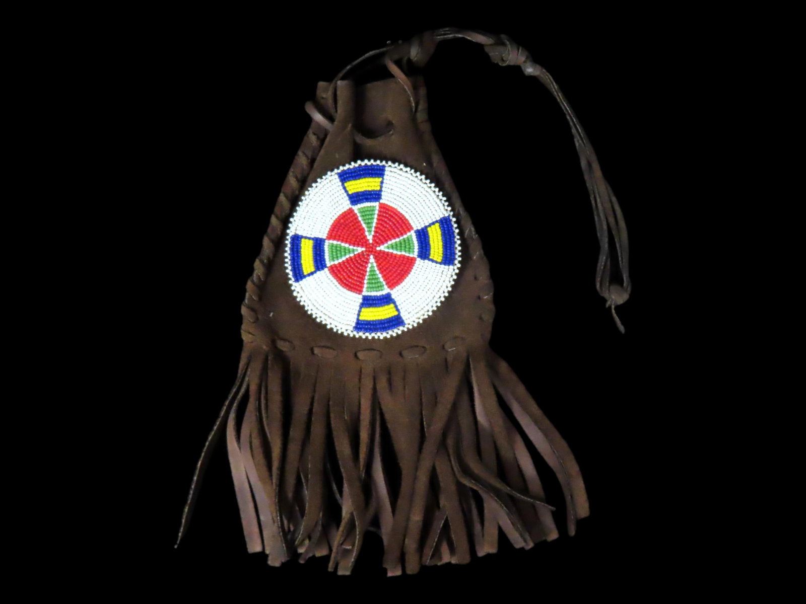Vintage Beaded Leather Pouch once owned by Bob Hamm- Old West Gun Spinning Twirler and Blade Thrower: Vintage Beaded Leather Pouch once owned by Bob Hamm- Old West Gun Spinning Twirler and Blade Thrower- and used in his exhibitions across the country.Robert "Bob" Hamm (1941-2022) was a 7-Time National