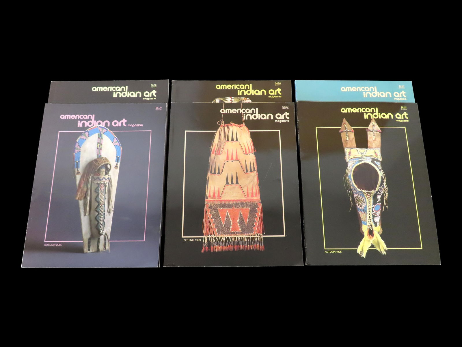 LOT OF AMERICAN INDIAN ART MAGAZINES, BEADED ITEMS, MOCCASINS, PLAINS ARTIFACTS, CRADLEBOARD, PIPE (1 of 12)