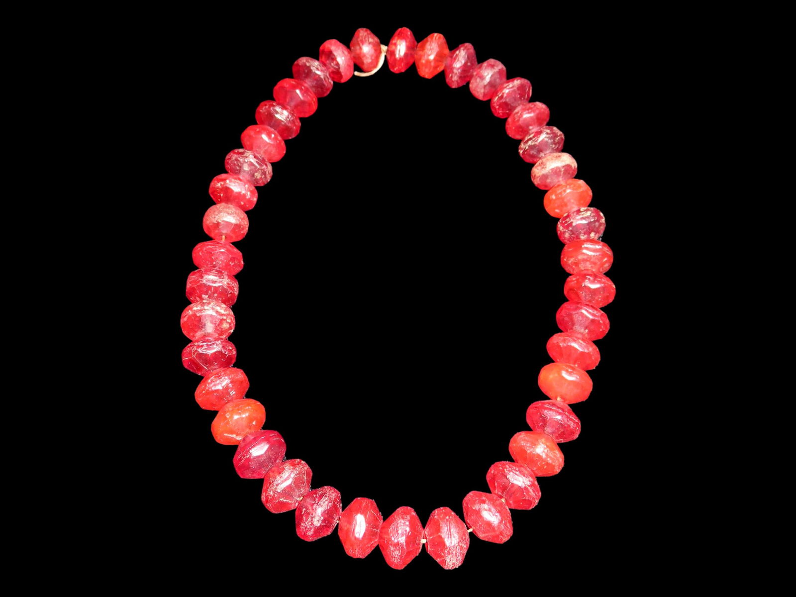 18" STRAND OF OLD RUBY RED VASELINE TRADE BEADS, URANIUM GLASS, BEAUTIFUL DEEP RICH COLOR (1 of 2)