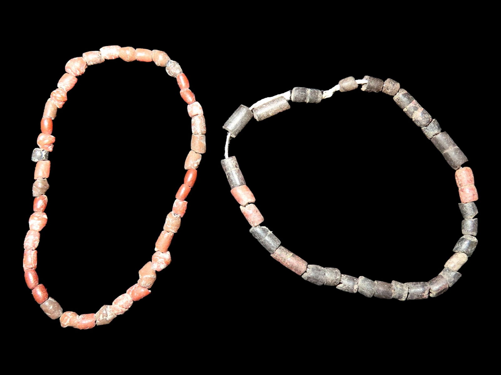 PAIR OF PRECOLUMBIAN STRANDS OF BEADS, BRACELETS, ONE RED ONE BLACK / GREY, EACH ABOUT 5" LONG, NICE (1 of 2)