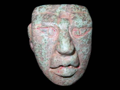 Incredible Mayan Jadeite Mask, Motley COA, Southern Mexico. Very Nicely Detailed example with: Incredible Mayan Jadeite Mask, Motley COA, Southern Mexico. Very Nicely Detailed example with amazing Color and Great polish. Drilled Multiple Times both for suspension and decoration, Was probably wo
