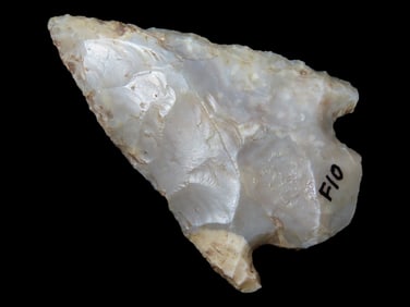 Highly Translucent Flint Ridge Corner Notch, Hocking County Ohio. Heavily Patinated example. Very