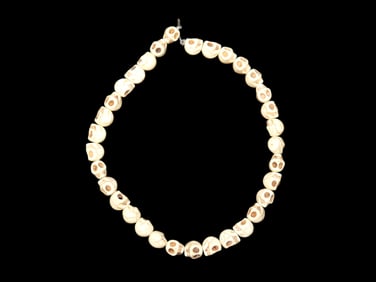Strand of White Stone Skull Beads