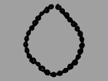 16" Strand of Black Skull Beads