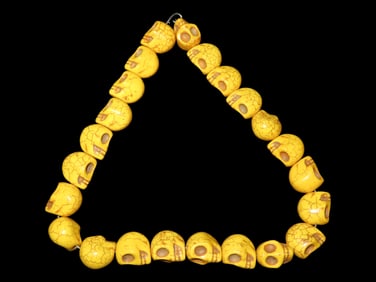 16" Strand of Yellow Skull Beads