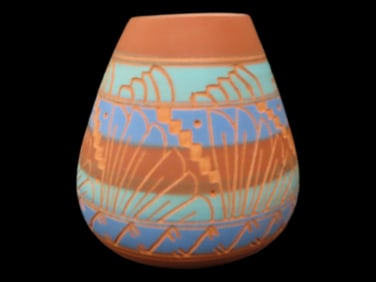 Red Orange Toned Pot with Light Orange, Teal, Blue, and Red Orange Design and Carving