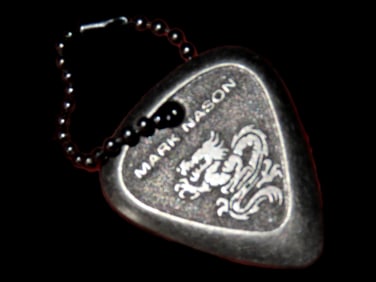 Mark Nason metal guitar pick / holed pendant - with dragon design