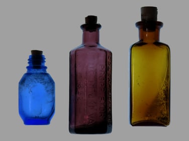 Group of 3 Antique Colored Glass Bottles w/cork stoppers