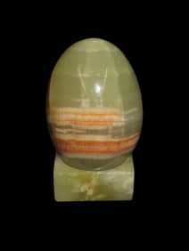 Highly Polished Carved Egg made of Green Onyx, a variety of chalcedony that often exhibits banded