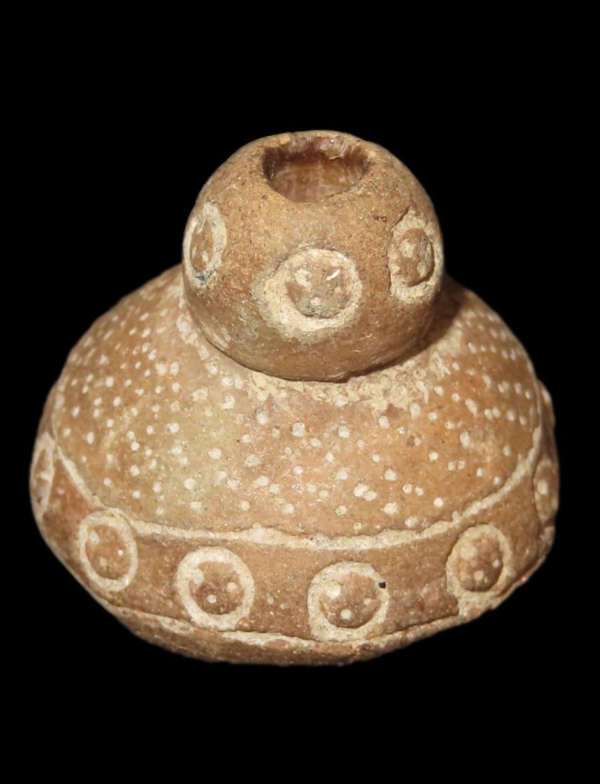 Heavily Engraved Clay Bead, Mexico. Elaborate Incised Design all the way around, Perforation in: Heavily Engraved Clay Bead, Mexico. Elaborate Incised Design all the way around, Perforation in Center for Suspension. Nice example.