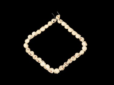 Strand of White Stone Skull Beads