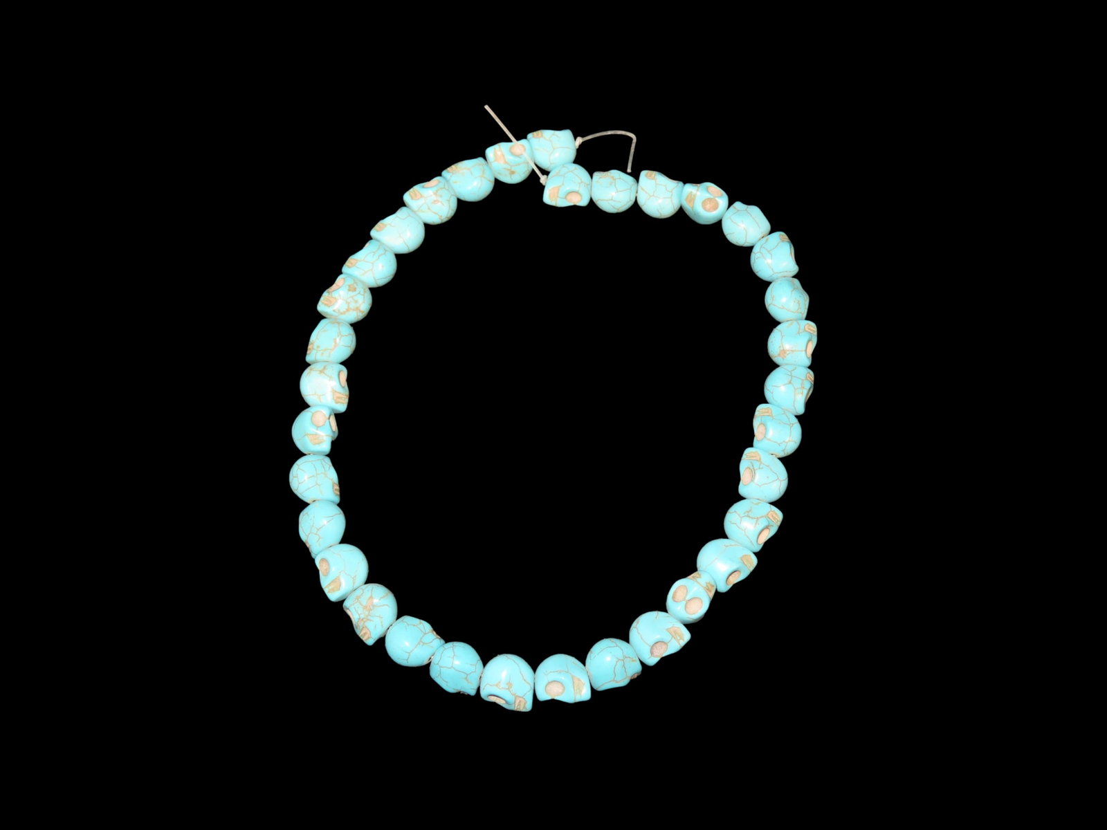 Strand of Skull Beads: Strand of Skull Beads