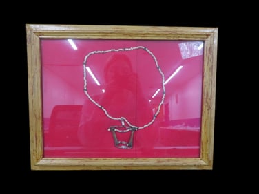 18 3/8" X 14 1/4" Frame Containing Necklace made of Hudson Bay Red Heart Beads with Bone Pendant,
