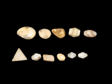 Group of 11 Ancient Banded Agate, Stone, and Quartz Trade Beads