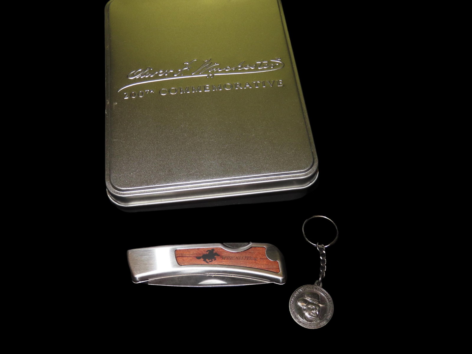 Commemorative Winchester Folding Knife and Keychais set in Tin.: Commemorative Winchester Folding Knife and Keychais set in Tin.