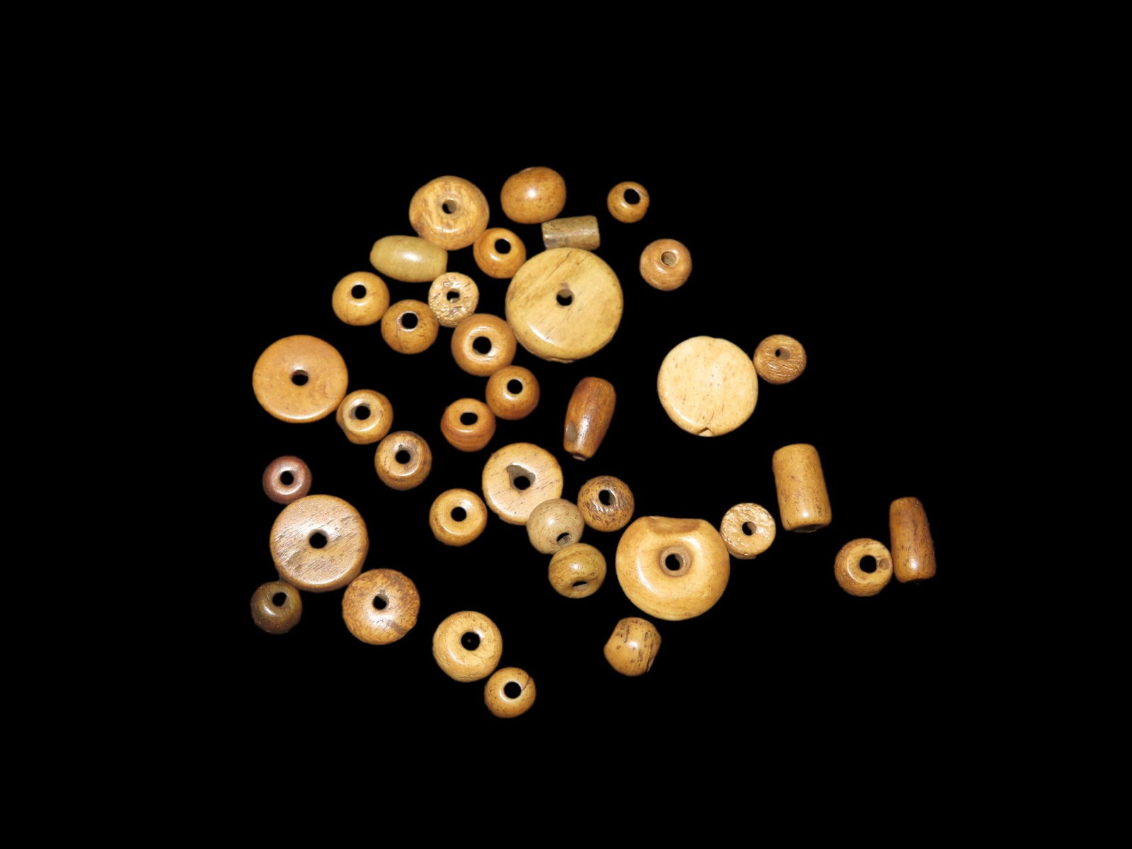 Lot of Drilled bone Beads from the Dakotas: Lot of Drilled bone Beads from the Dakotas