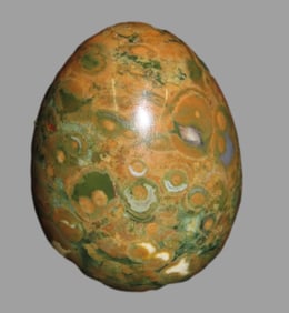 2"  Polished Rainforest Jasper (Rhyolite) egg.It is a form of rhyolitic lava that formed from the