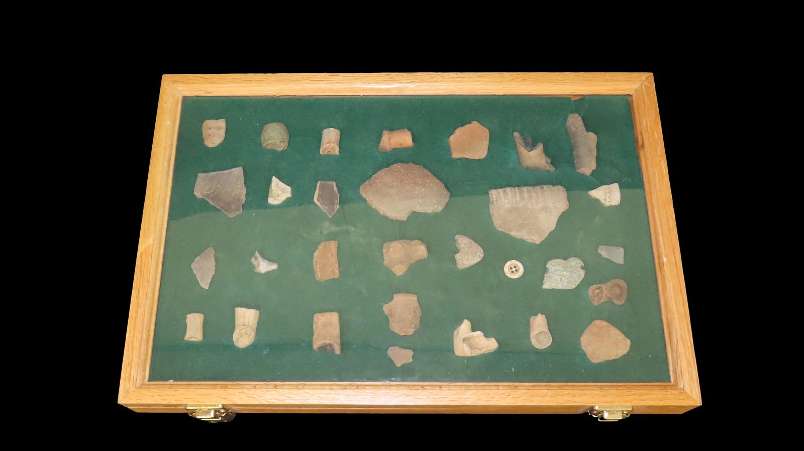 12" x 18" Frame containing Pottery Shards, Broken pieces of pipe, bone and more: 12" x 18" Frame containing Pottery Shards, Broken pieces of pipe, bone and more