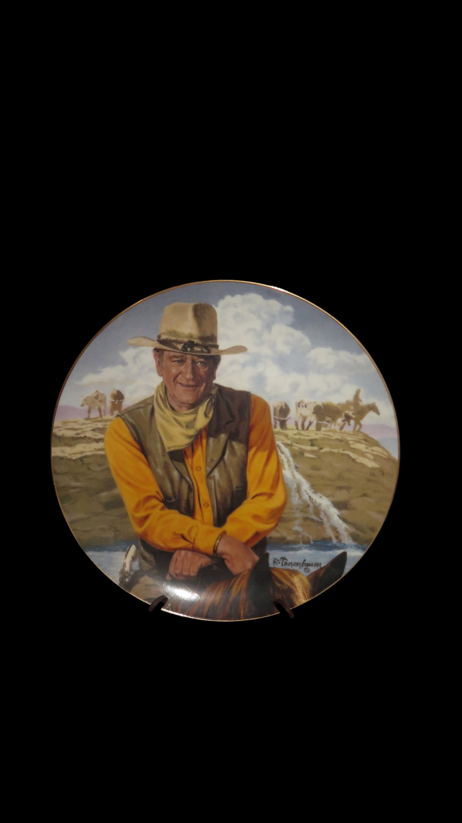 8 1/4" John Wayne Heirloom Collector Plate by Robert Tanenbaum, The Rugged Horseman, The Franklin: 8 1/4" John Wayne Heirloom Collector Plate by Robert Tanenbaum, The Rugged Horseman, The Franklin Mint COA, Crafted of fine porcelain and bordered in 24 karat gold