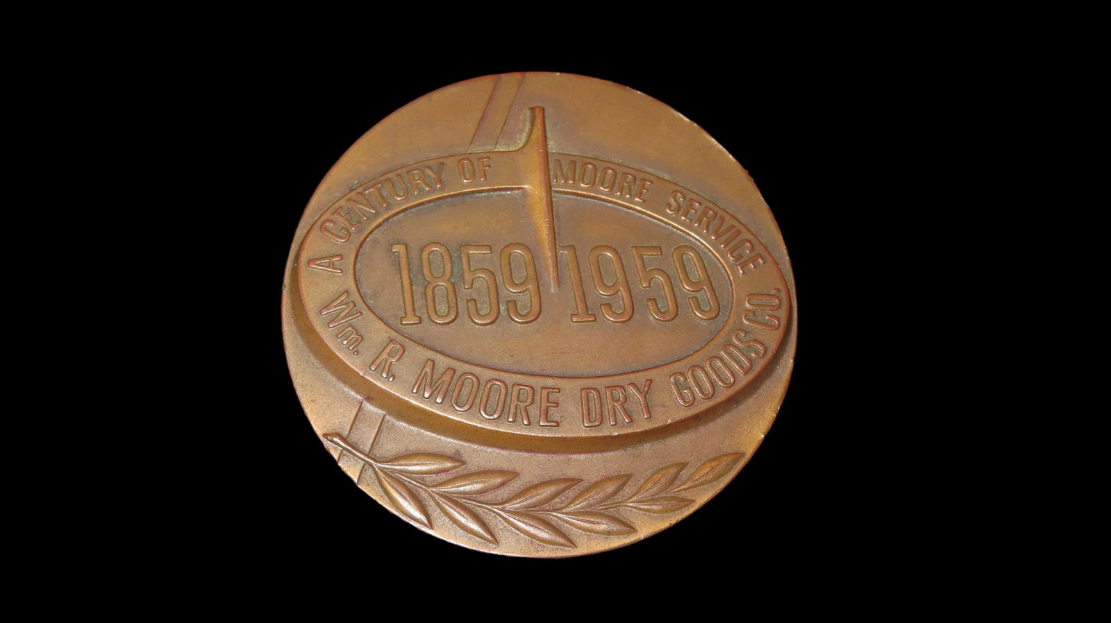 2 1/2" Vintage Commemorative Coin Marking a "Century of Service" for the William R. Moore Dry Goods (1 of 3)