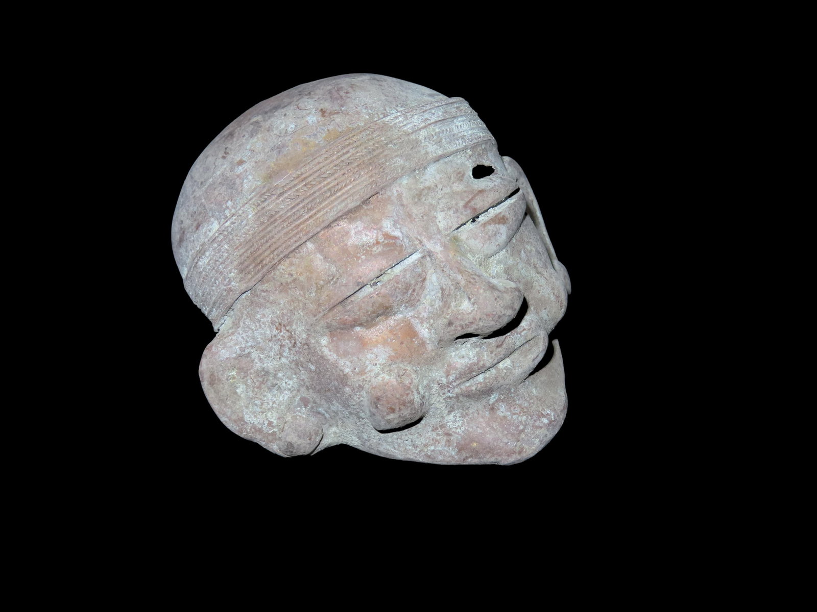 3 1/4" x 3 3/4" Warrior Effigy Head. Copper. Peru. Motley / Leithoff COA.: 3 1/4" x 3 3/4" Warrior Effigy Head. Copper. Peru. Motley / Leithoff COA.