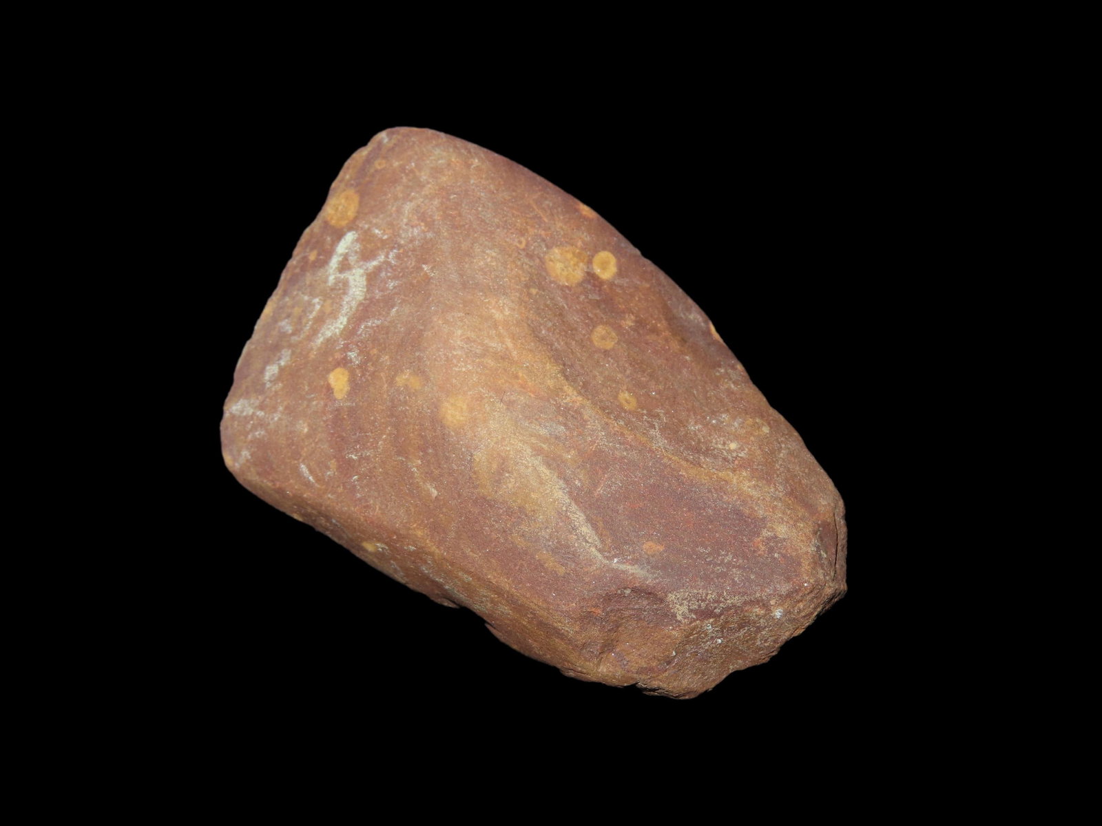 2 1/2" Celt. Red Stone. Neolithic Period. Africa.: 2 1/2" Celt. Red Stone. Neolithic Period. Africa.