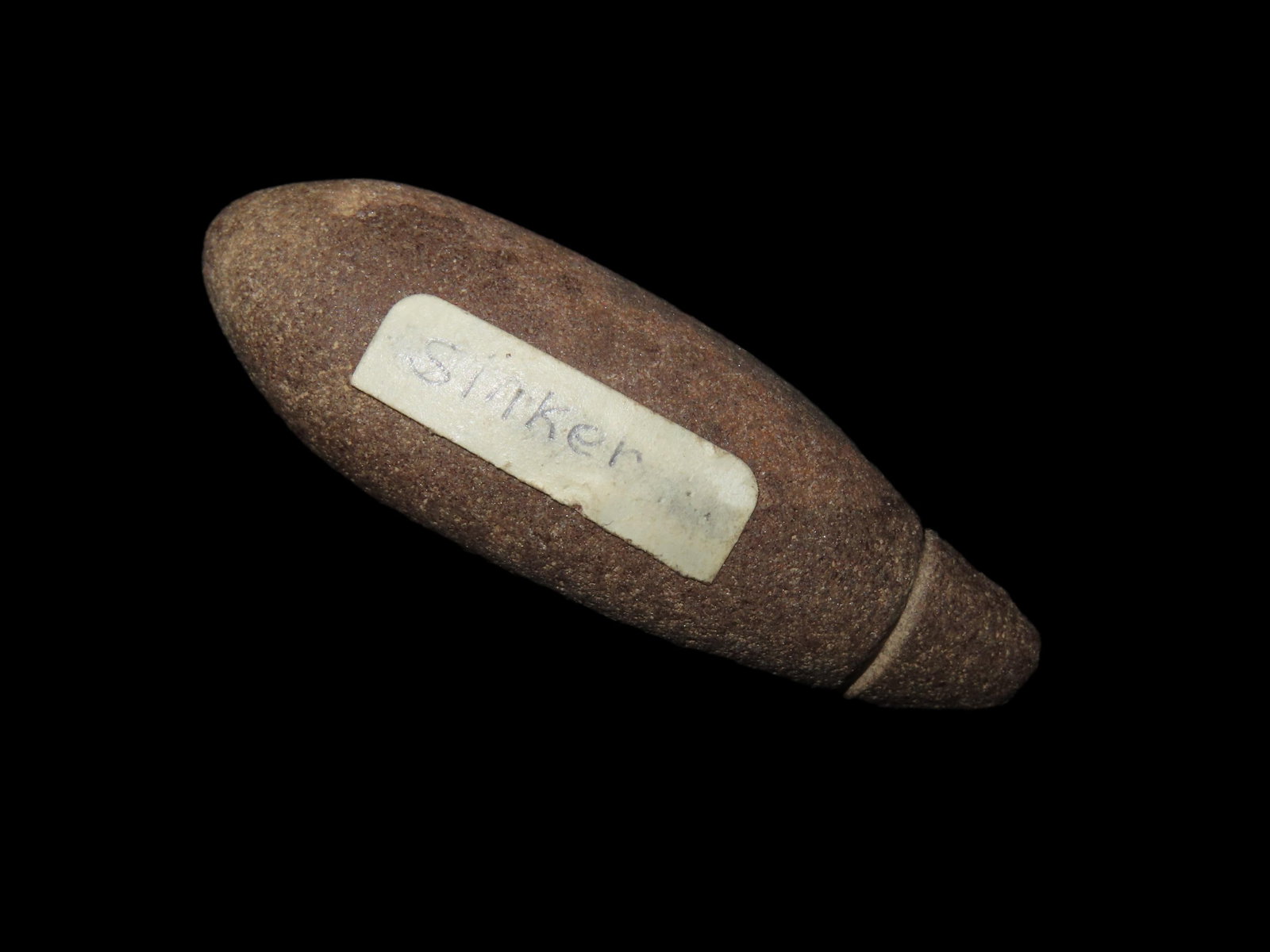 2 5/8" Hardstone Grooved Plummet. Clinton County, Illinois. (1 of 6)