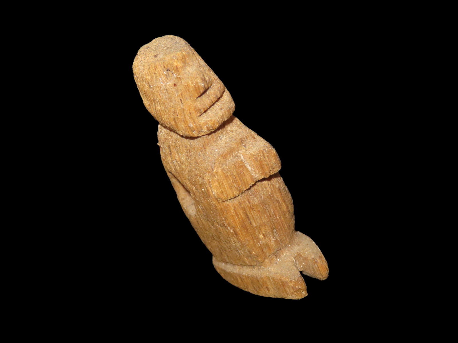 Alaskan Human Effigy Pendant, Motley COA. Very well made from Fossilized Bone. Nicely Detailed full: Alaskan Human Effigy Pendant, Motley COA. Very well made from Fossilized Bone. Nicely Detailed full figure Human effigy, stands up on its own. Drilled for suspension. Found in Alaska.