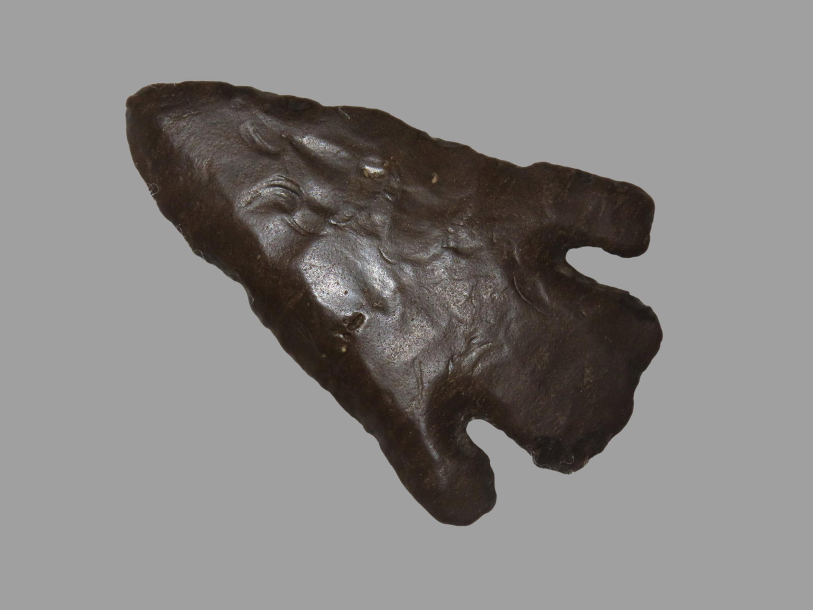 3" Calf Creek, Pontotoc Co. Oklahoma, found along the Canadian River. Heavily Water Worn with great: 3" Calf Creek, Pontotoc Co. Oklahoma, found along the Canadian River. Heavily Water Worn with great water patina. Both ears intact.