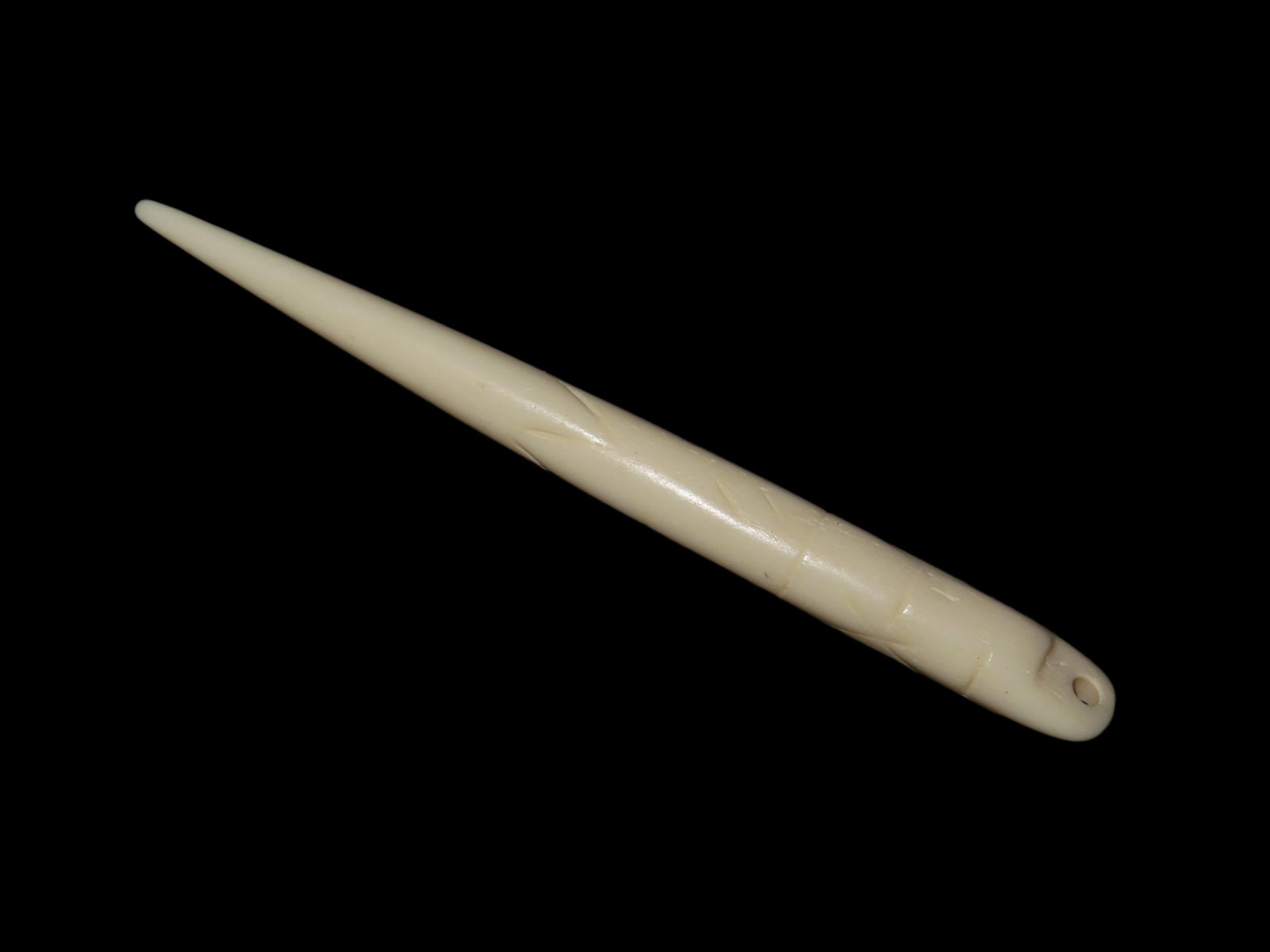 3 3/8" Engraved Bone Pendant found in South Dakota. Highly Polished Example, Mandan Culture, Circa: 3 3/8" Engraved Bone Pendant found in South Dakota. Highly Polished Example, Mandan Culture, Circa 1600-1700's