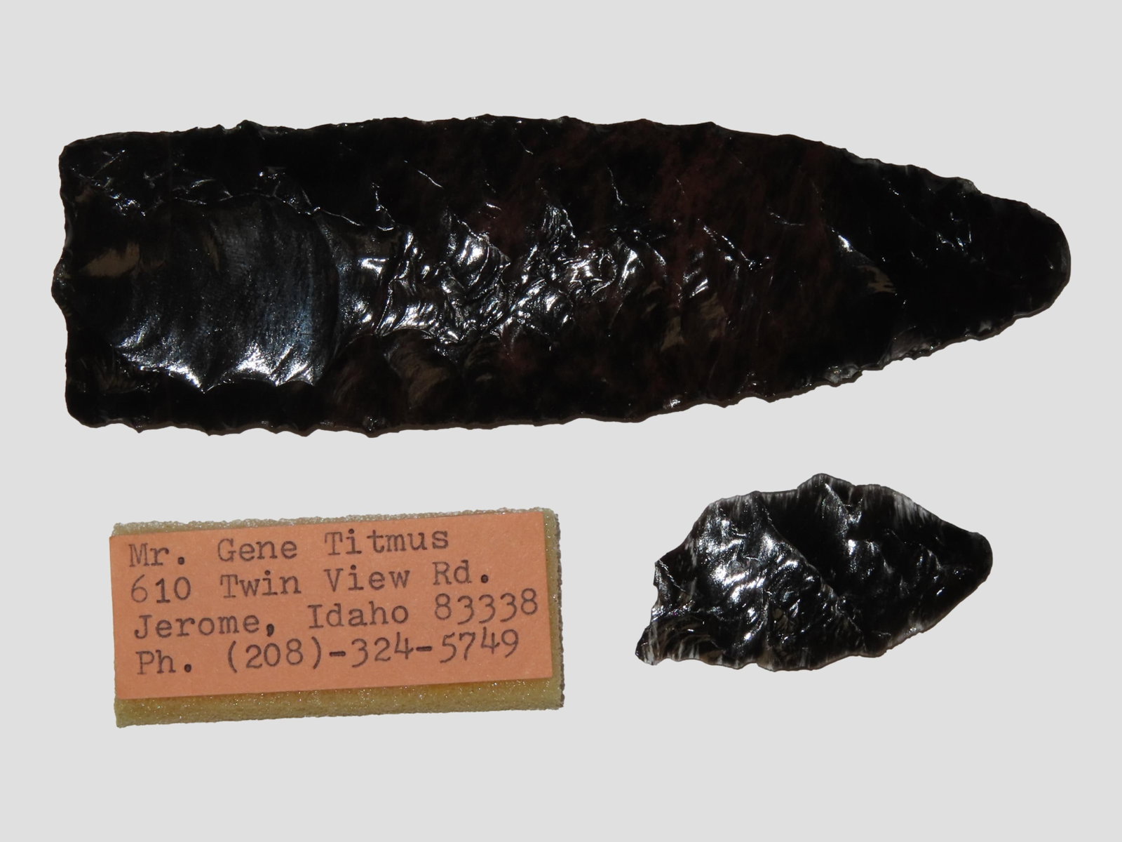 4 7/8" Modern Clovis and Fluted Piece, Made of Volcanic Glass, Made by Gene Titmus, 4/24/1988, at a: 4 7/8" Modern Clovis and Fluted Piece, Made of Volcanic Glass, Made by Gene Titmus, 4/24/1988, at a Knappers Demonstration at the Museum of Science