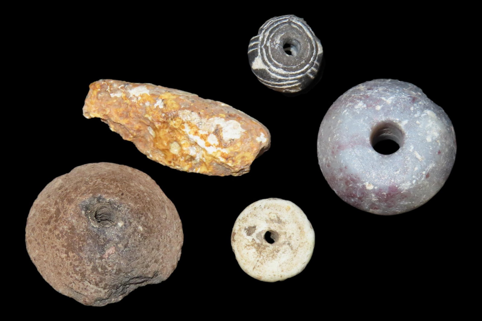 Nice lot of Drilled Pre-Columbian Beads, Stone, Clay, & Shell, some engraved. Found in Mexico. One: Nice lot of Drilled Pre-Columbian Beads, Stone, Clay, & Shell, some engraved. Found in Mexico. One is a olorful Purple stone, well polished.