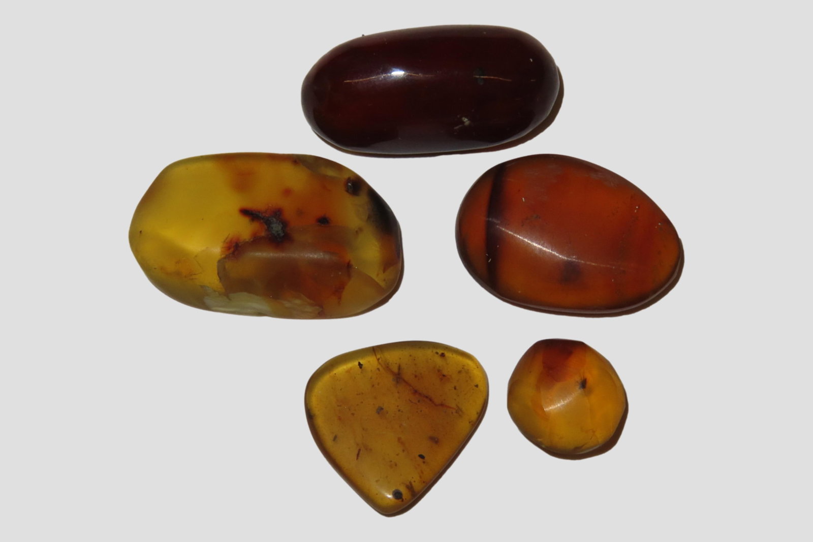 Lot of Fossil Amber, some with small bugs or partial bugs that were partially eaten by another (1 of 3)