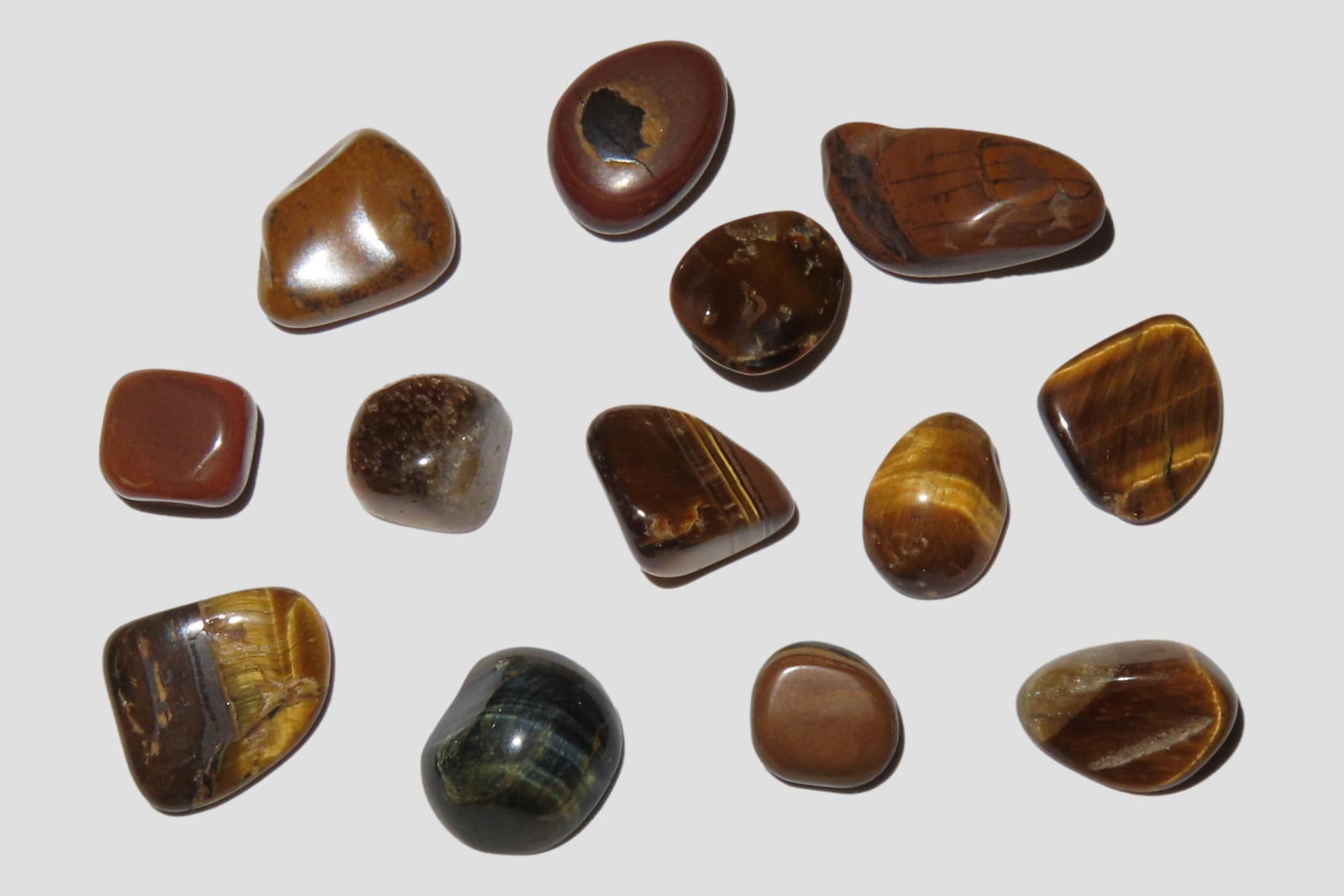 Lot of Polished Tiger Eye Gemstones. (1 of 2)
