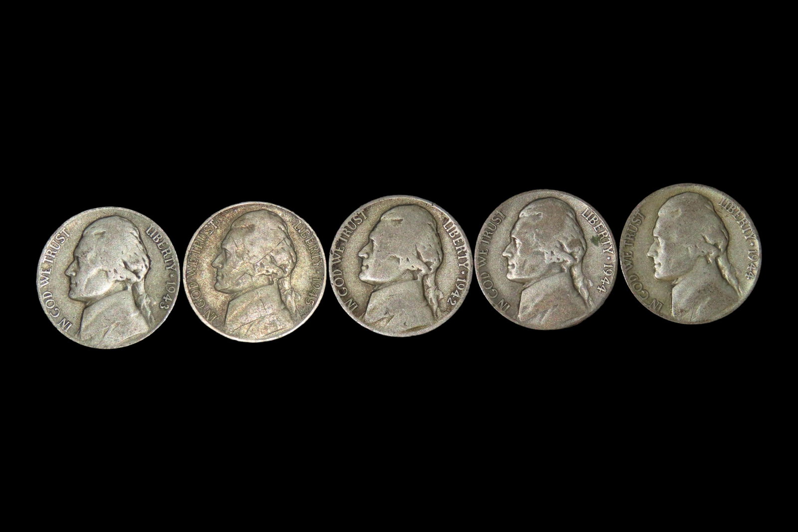 Lot of 5 Silver Wartime Nickels, Made from Silver. Only made from 1942-1945 during World War 2: Lot of 5 Silver Wartime Nickels, Made from Silver. Only made from 1942-1945 during World War 2 because Nickel was needed for use in Armor Plating. Great Piece of History, and a great invesment the