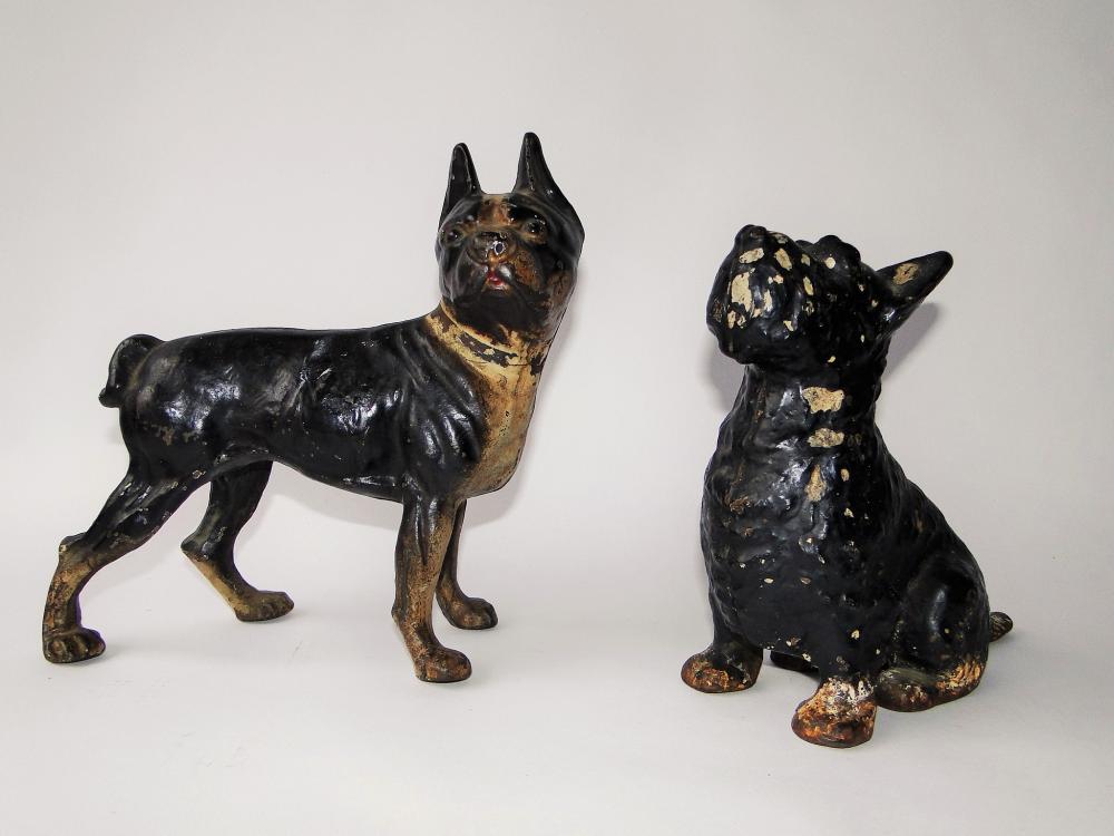 TWO DOG DOORSTOPS (1 of 3)