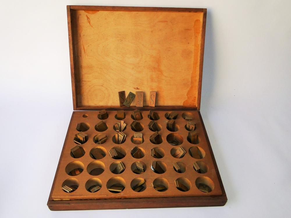 BOX OF BRASS STENCILS (1 of 3)