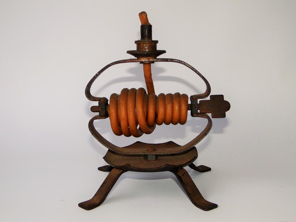 EARLY IRON WAX JACK LIGHTING DEVICE: EARLY IRON WAX JACK LIGHTING DEVICE, 7 X 7
