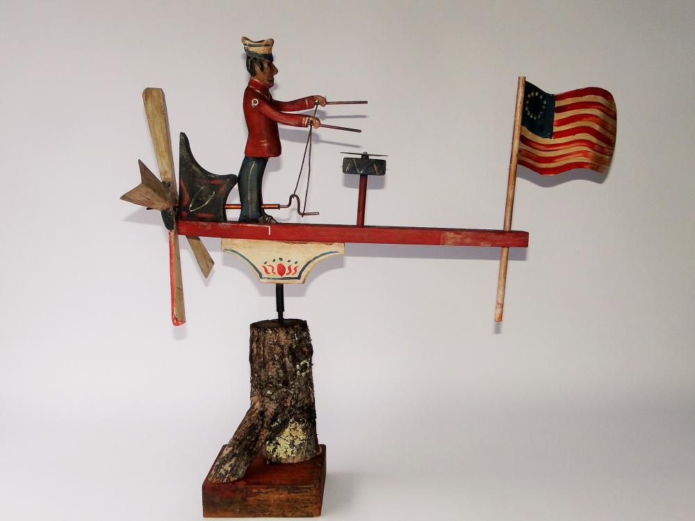 WONDERFUL RED COATED DRUMMER WHIRLIGIG: WONDERFUL RED COATED DRUMMER WHIRLIGIG, GOOD ORIGINAL PAINT, AMERICAN FLAG, WORKING CONDITION, 22 X 24