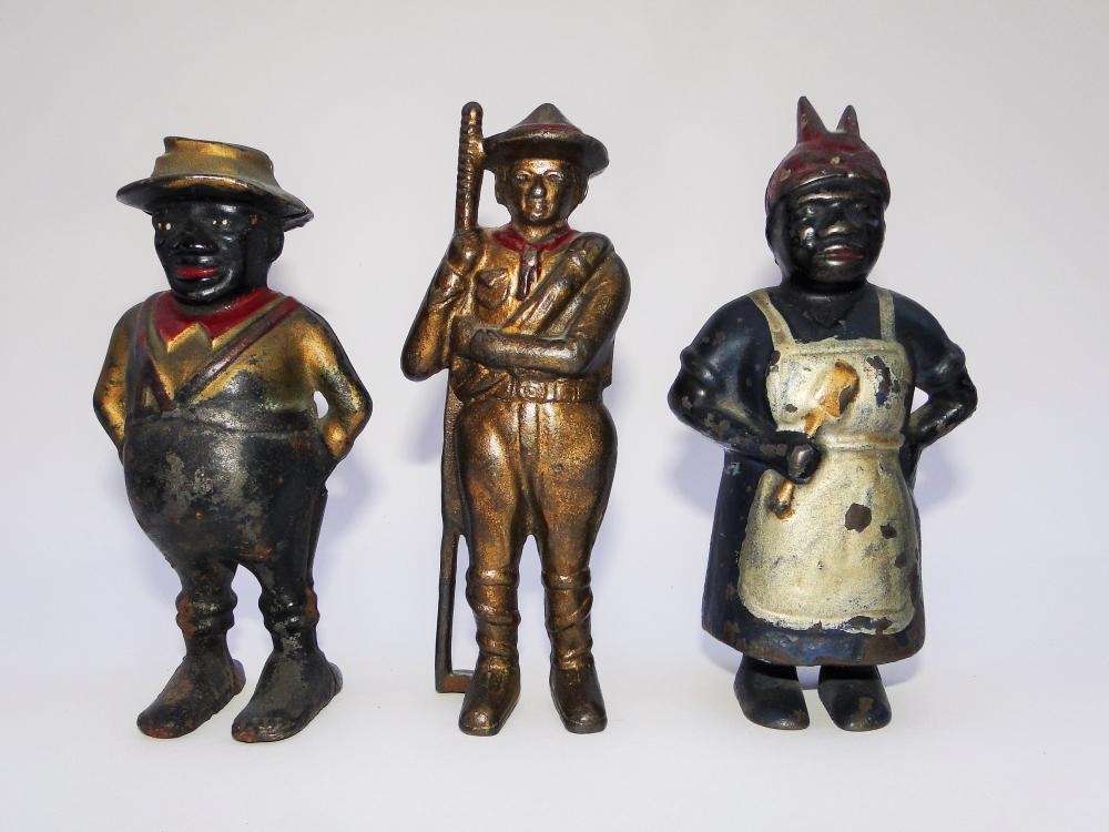 THREE ANTIQUE CAST IRON STILL BANKS: THREE ANTIQUE CAST IRON STILL BANKS, BLACK AMERICAN MAMMY , UNCLE JOE, SOLDIER, 5.5", 6"