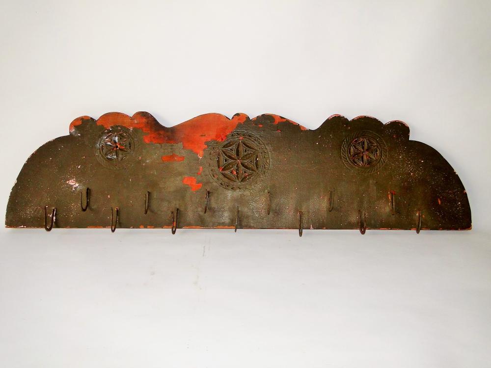 18TH C EARLY CARVED MEAT RACK: 18TH C EARLY CARVED MEAT RACK, ORIGINAL RED PAINTED SURFACE WITH AN EARLY OLIVE OVERPAINT, ORIGINAL HAND FORGED HOOKS, 11 X 42