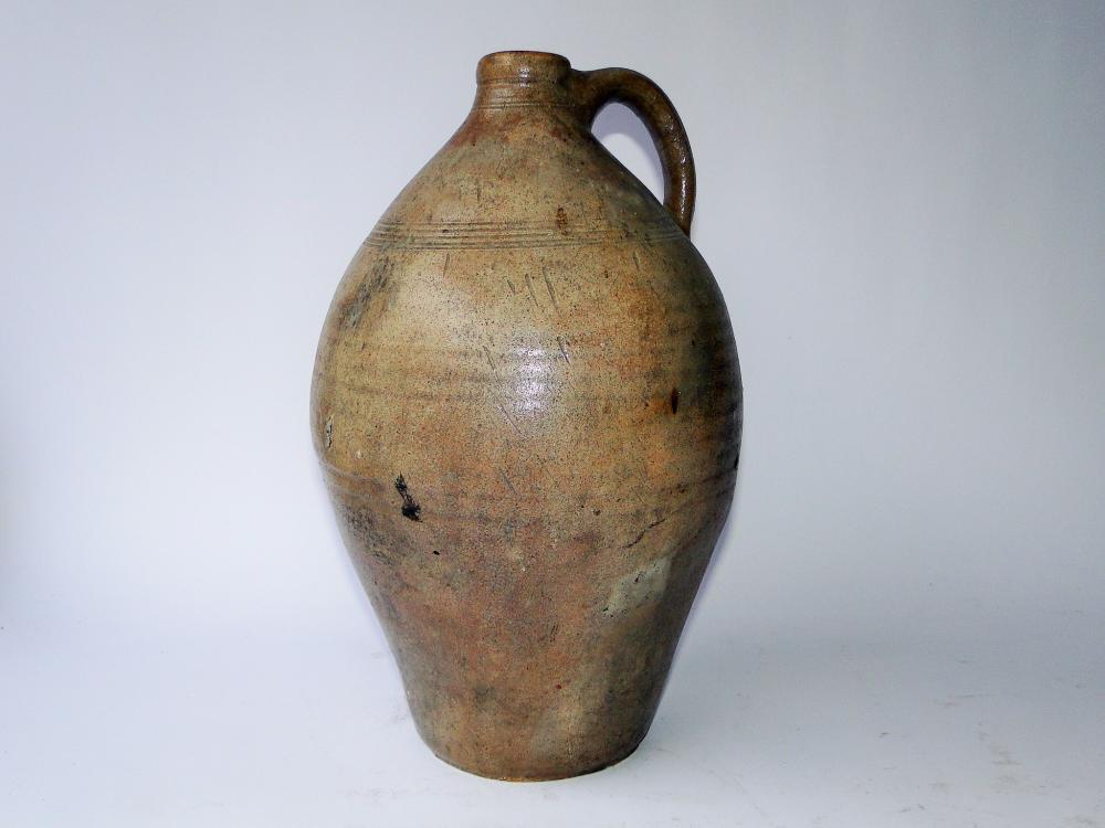EARLY PRIMITIVE STONEWARE OVOID JUG (1 of 4)