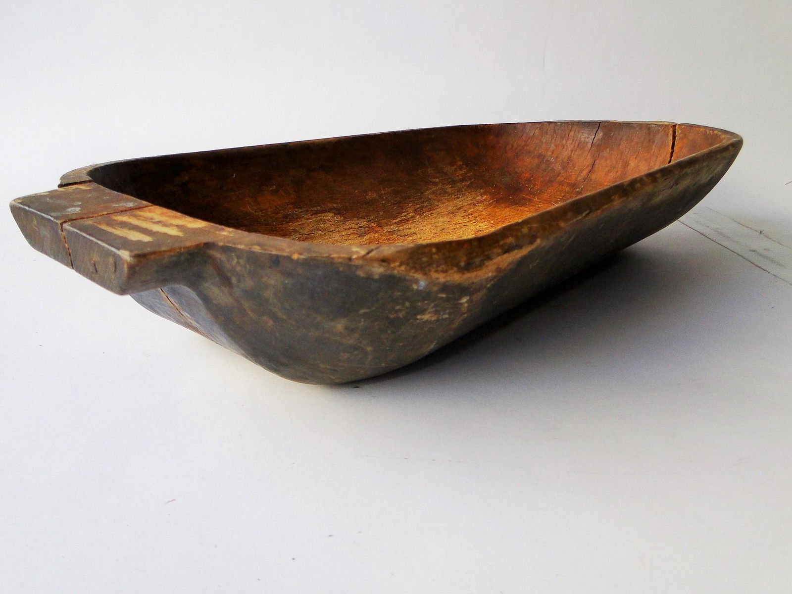 EARLY UNPAINTED TRENCHER BOWL, DARK OXIDIZED SURFACE, (1 of 4)