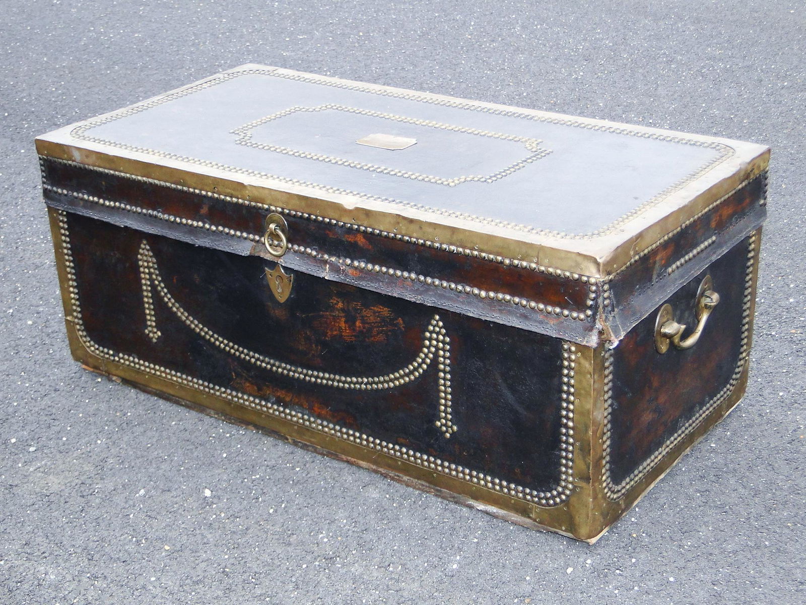 19TH C BLACK LEATHER BRASS BOUND CHEST, BRASS SWAG (1 of 5)