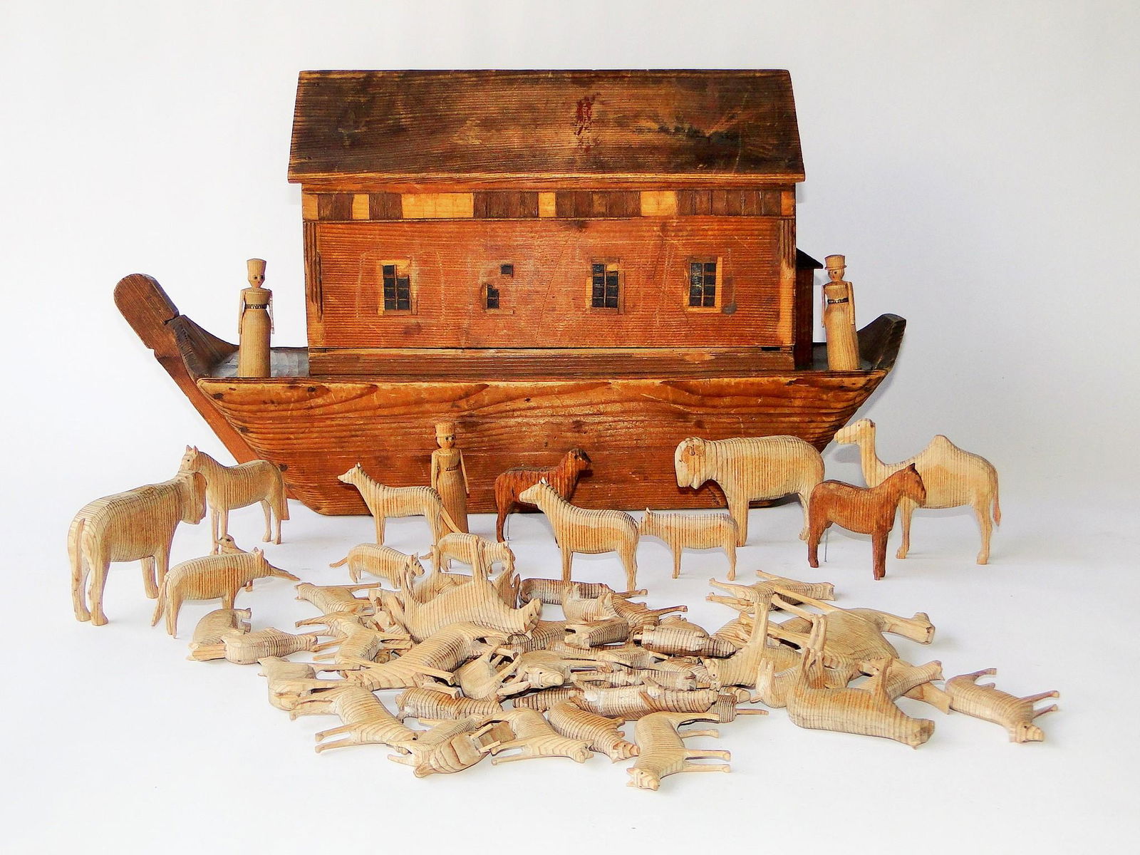 PRIMITIVE NOAHS ARK W/ CARVED ANIMALS (1 of 4)