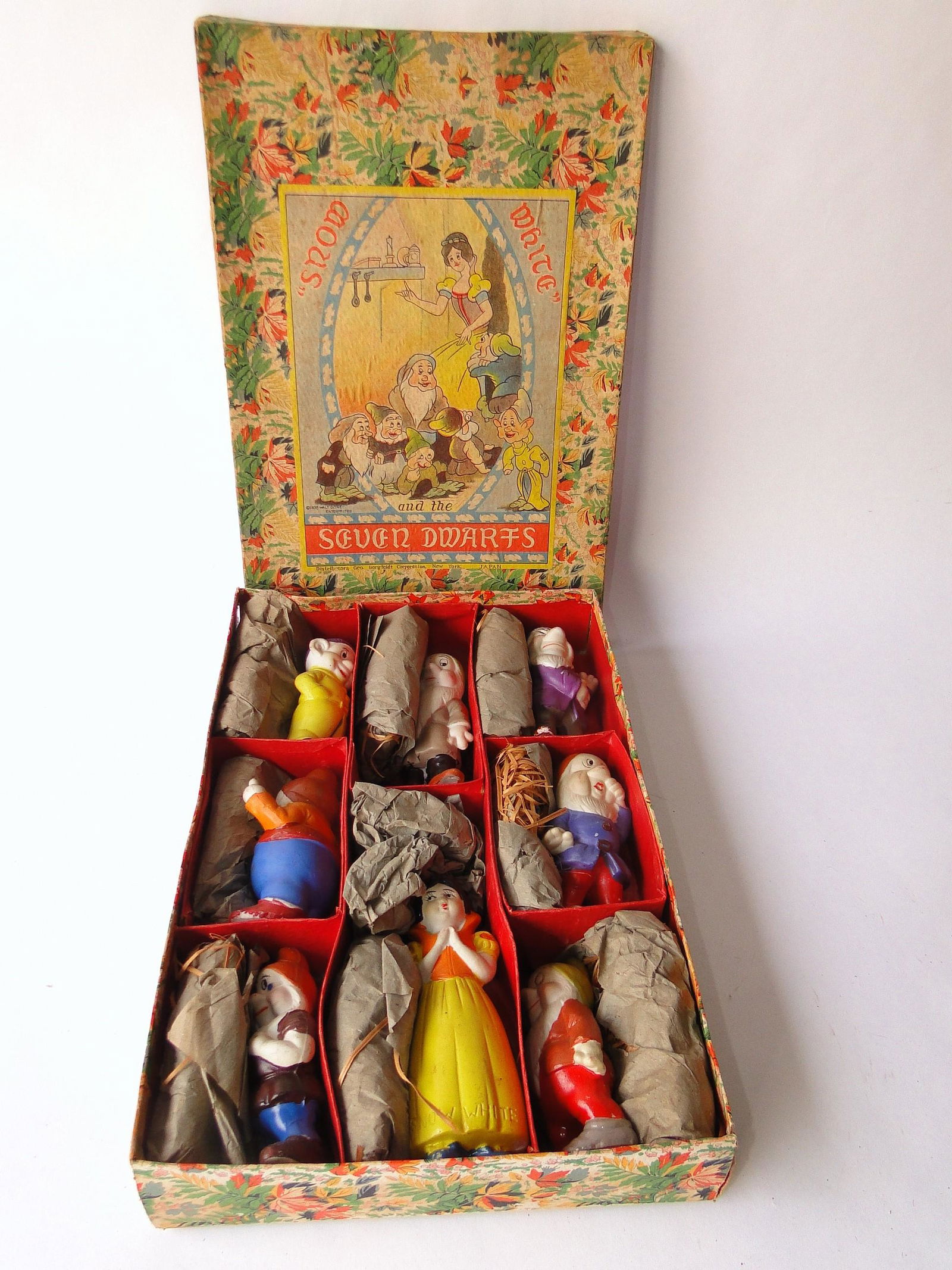 C. 1938 SNOW WHITE SEVEN DWARFS FIGURES (1 of 3)