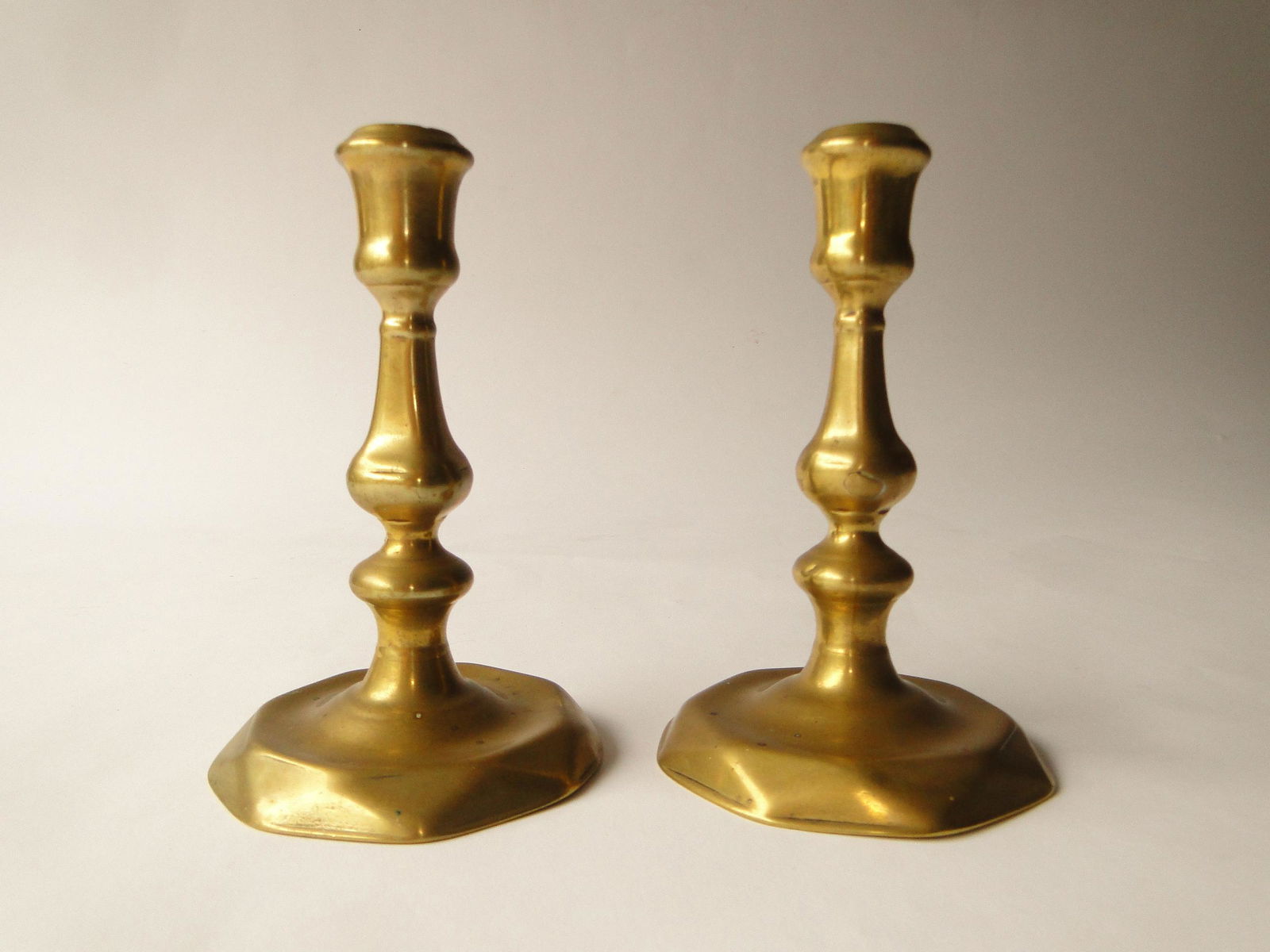 PAIR EARLY 18TH C. QUEEN ANNE CANDLESTICKS (1 of 2)