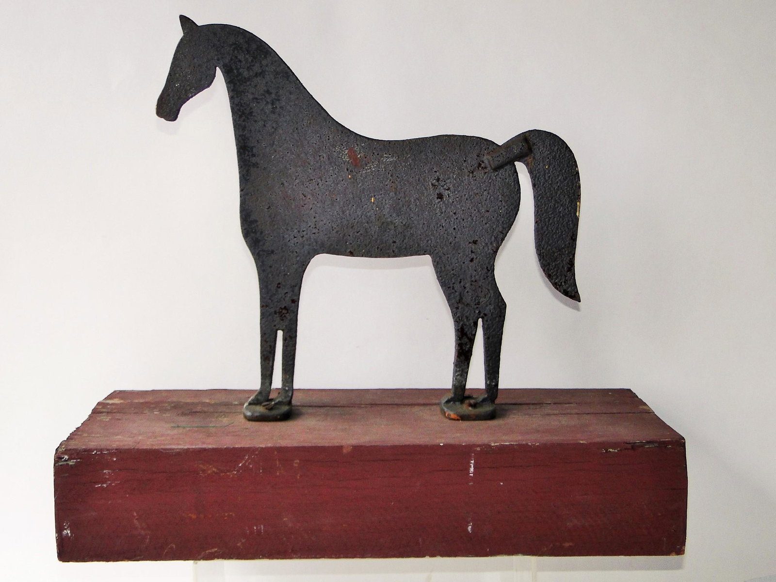 IRON HORSE WINDMILL WEIGHT, MOUNTED ON A STAND, 14 X 18: IRON HORSE WINDMILL WEIGHT, MOUNTED ON A STAND, EXHIBITING STURBRIDGE VILAGE MAKERS MARK. 14 X 18