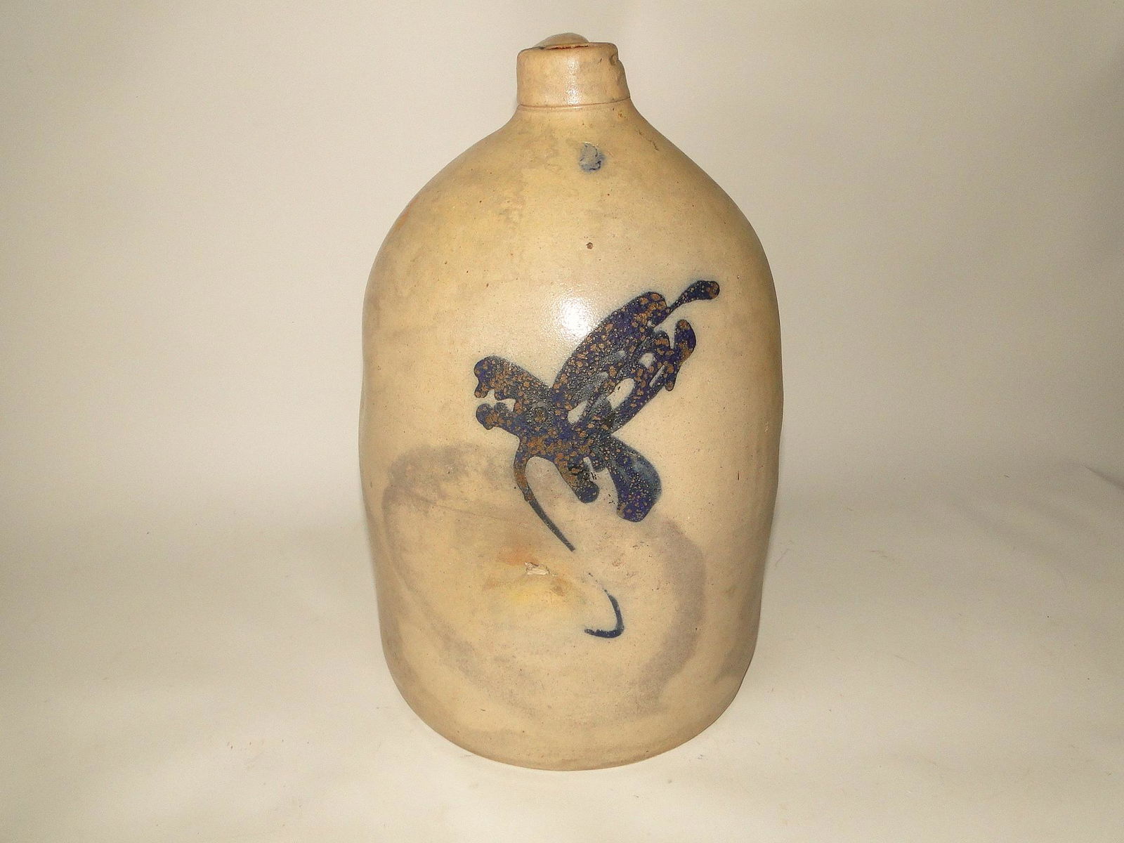 TWO GALLON STONEWARE JUG WITH BLUE BIRD (1 of 2)